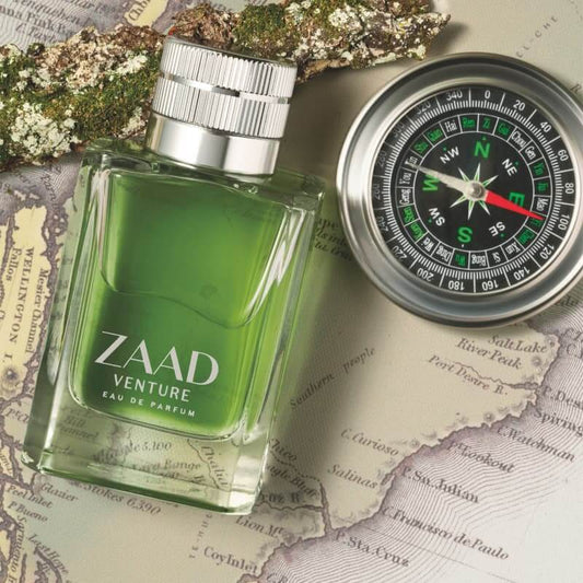 Zaad Venture Eau de Parfum met kompas en landkaart – symbool van ontdekking en avontuur