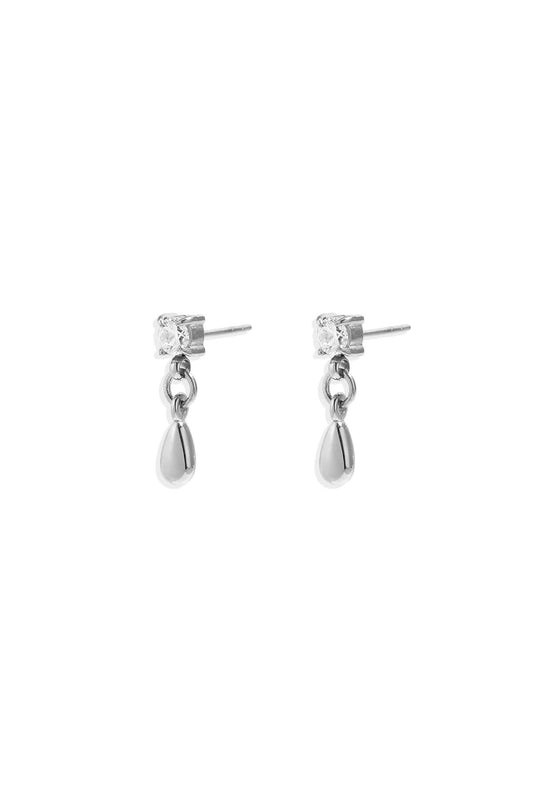Minimalistische stud oorbellen met hangende druppel in de kleur zilver. Gemaakt van roestvrij staal.