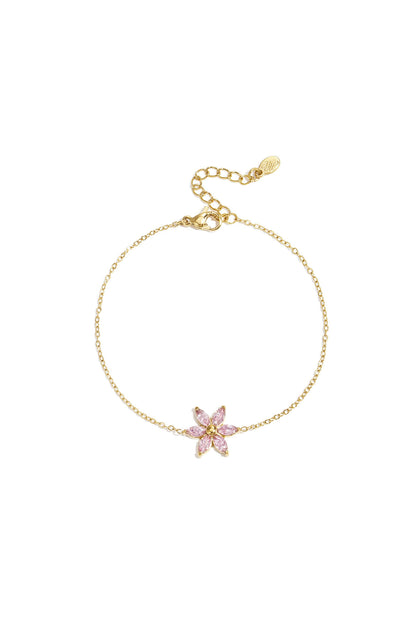 Gouden stainless steel armband met een roze bloem bedel