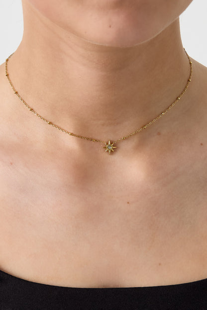 Minimalistische gouden ketting van roestvrijstaal met vallende ster bedel